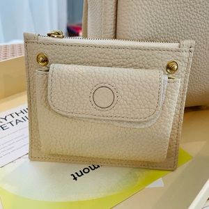 Songmont leather inner pouch wallet with zip closures (brand new)